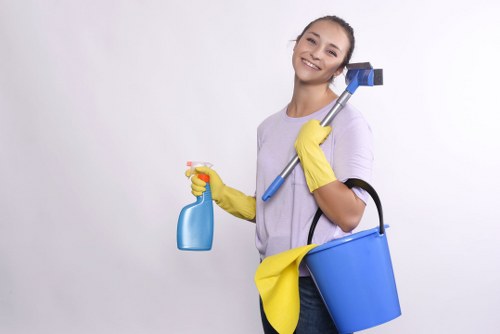 Local carpet cleaning team in Cheam assessing carpet fibres