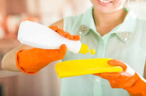 Technician wearing PPE during carpet cleaning
